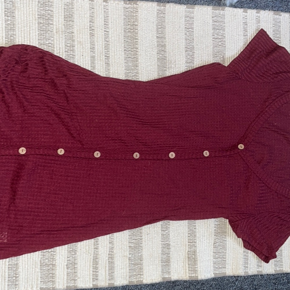 Cute dress with fake buttons.